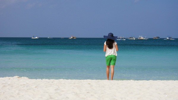 the sand is white and the water's clean