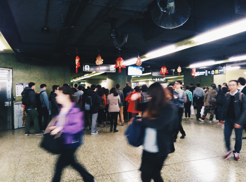 a busy subway in hong kong